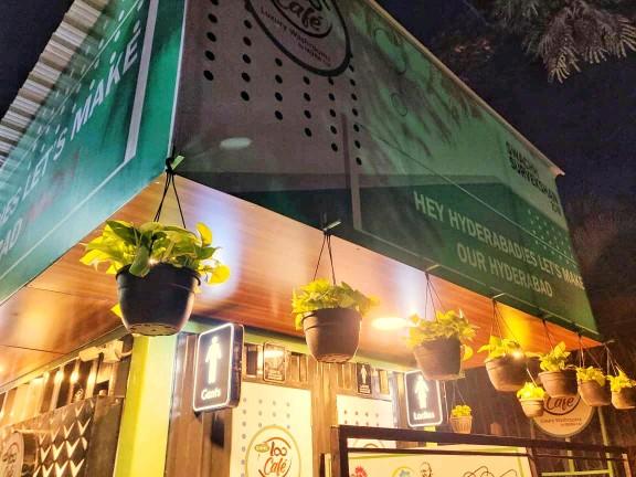 LooCafe facility at night with Hey Hyderabadies signage
