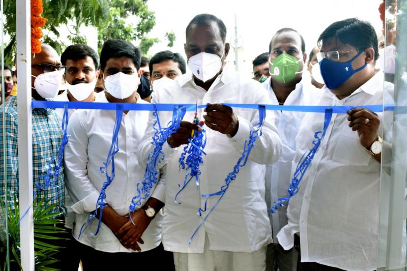 Official ribbon cutting ceremony with government dignitaries
